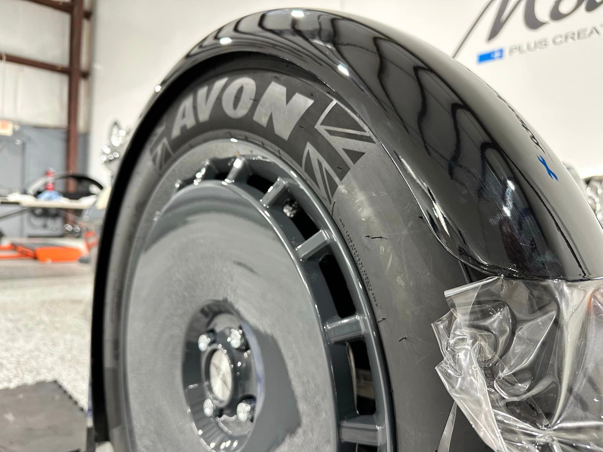 A close up of a avon tire on a car