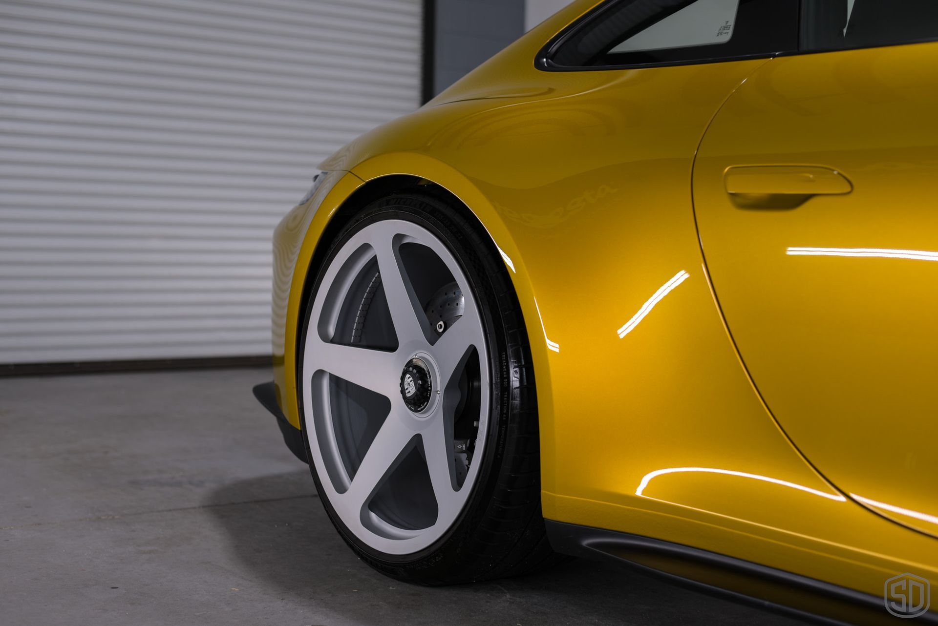 Porsche 911 GT3 Touring Detailing with Aenso Car Care Products rear wheel close up Orlando