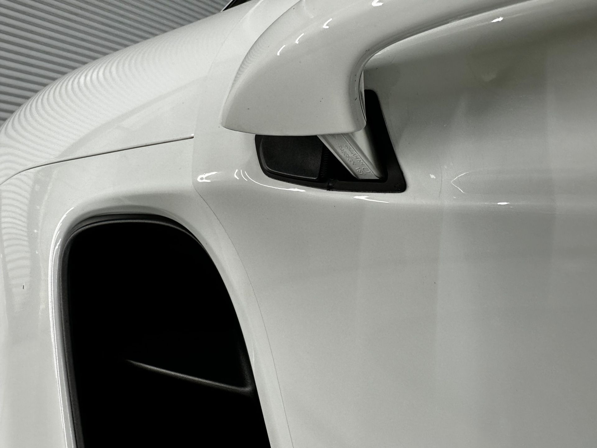 Porsche Cayman S Maintenance Detail with Aenso door handle close up Orlando, Florida USA