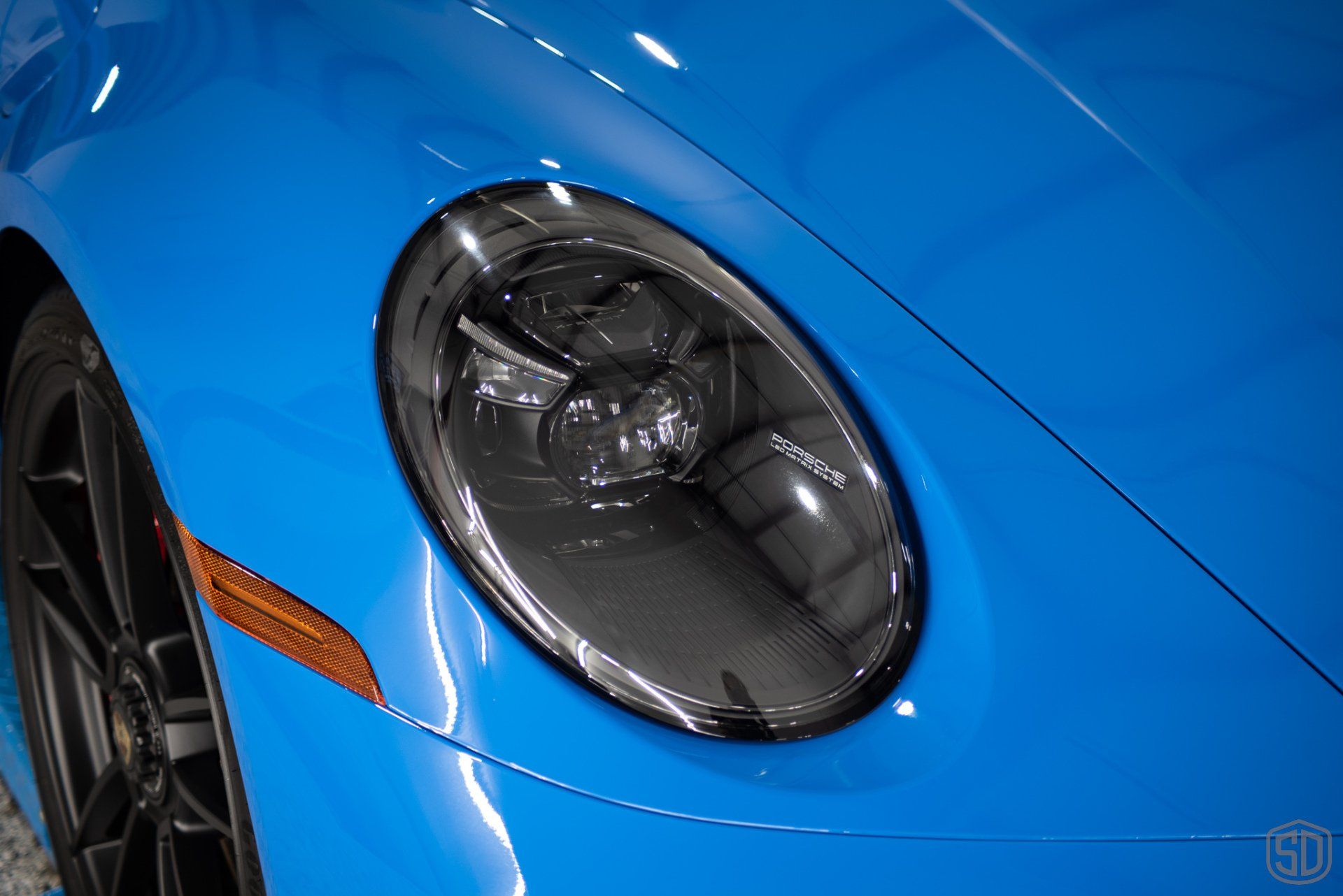Shark Blue Porsche 911 Carrera GTS Detailing, Paint Correction, Paint Protection Film, Aenso Gleam Spray Sealant headlight close up Orlando, FL