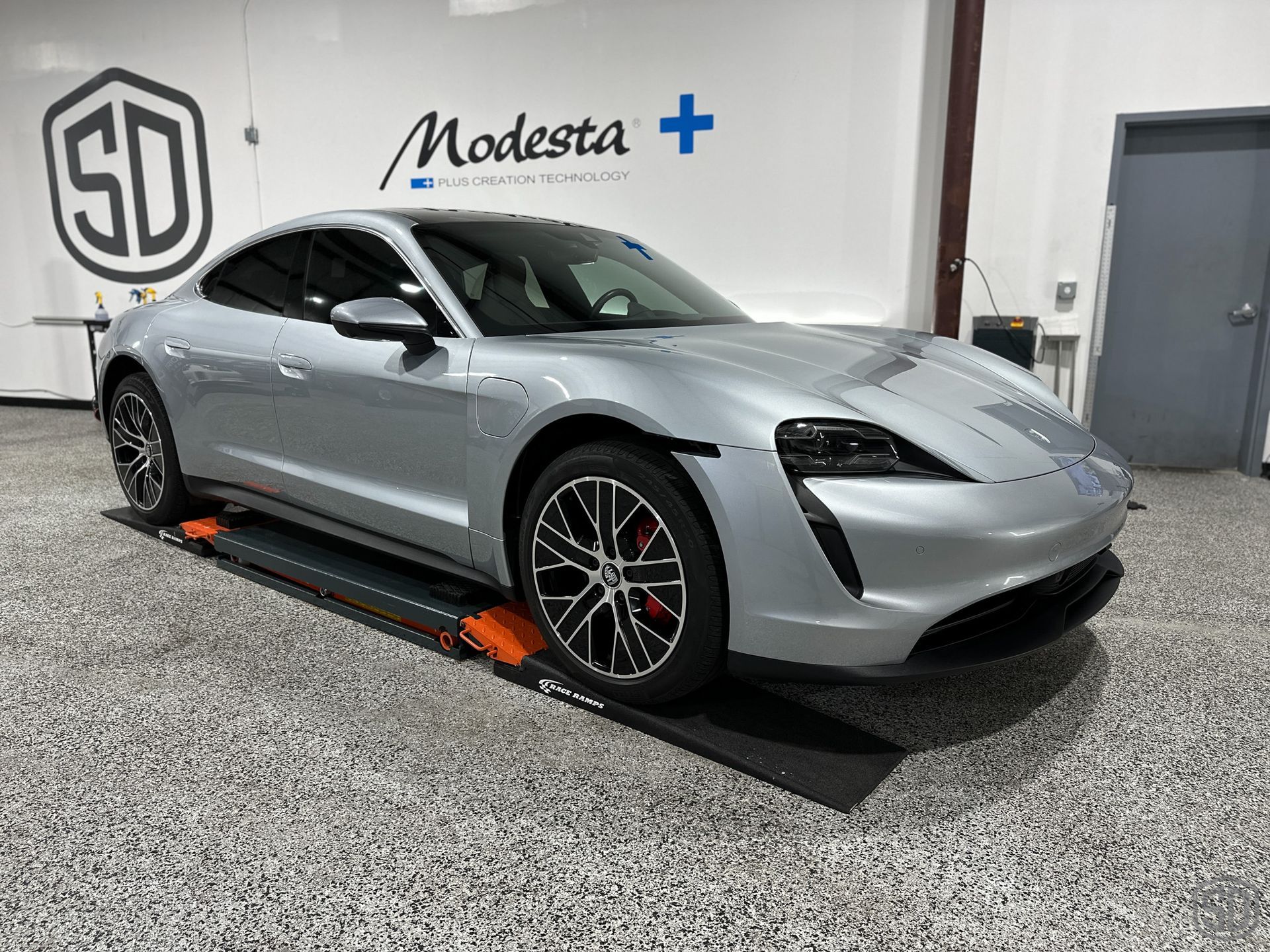 glossy finish on silver Porsche Taycan