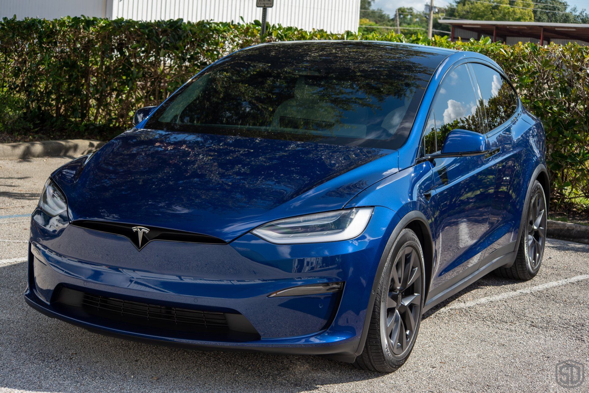 Tesla Model X Plaid Paint Correction Paint Protection Film Modesta Ceramic Glass Coating, Modesta Leather and Wheel Protection front end view Orlando Florida