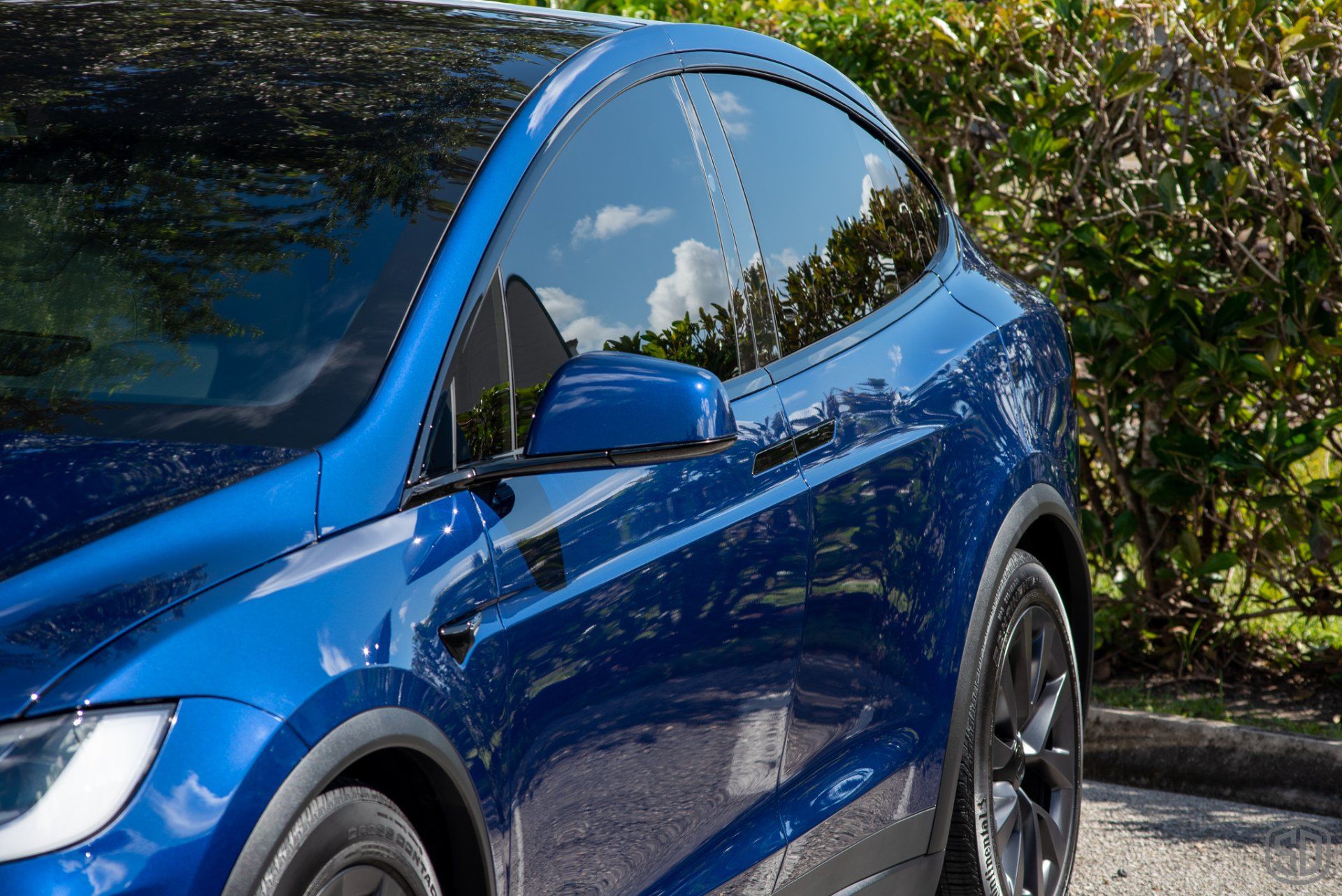 Tesla Model X Plaid Paint Correction Paint Protection Film Modesta Ceramic Glass Coating, Modesta Leather and Wheel Protection side view Orlando Florida