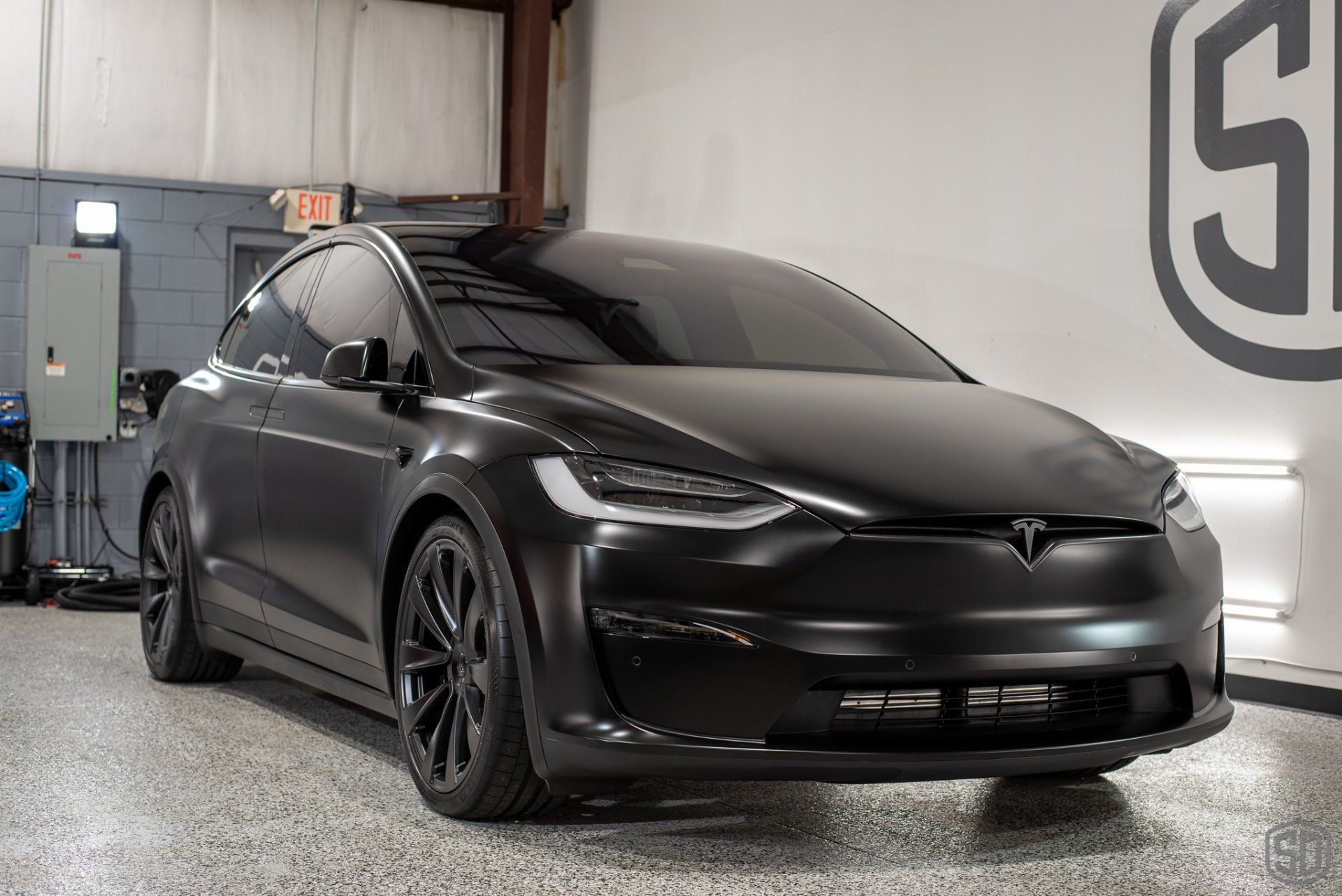 Tesla Model X Plaid Paint Correction Paint Protection Film Modesta Ceramic Glass Coating, Modesta Leather and Wheel Protection front end view Florida