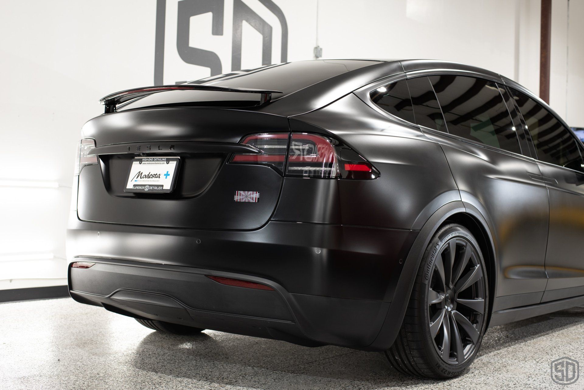 Tesla Model X Plaid Paint Correction Paint Protection Film Modesta Ceramic Glass Coating, Modesta Leather and Wheel Protection rear view Florida