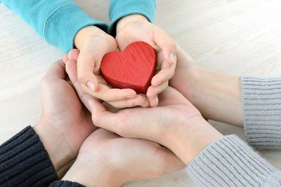 Family Law — Hands of a Family with Red Heart in Luzerne County, PA
