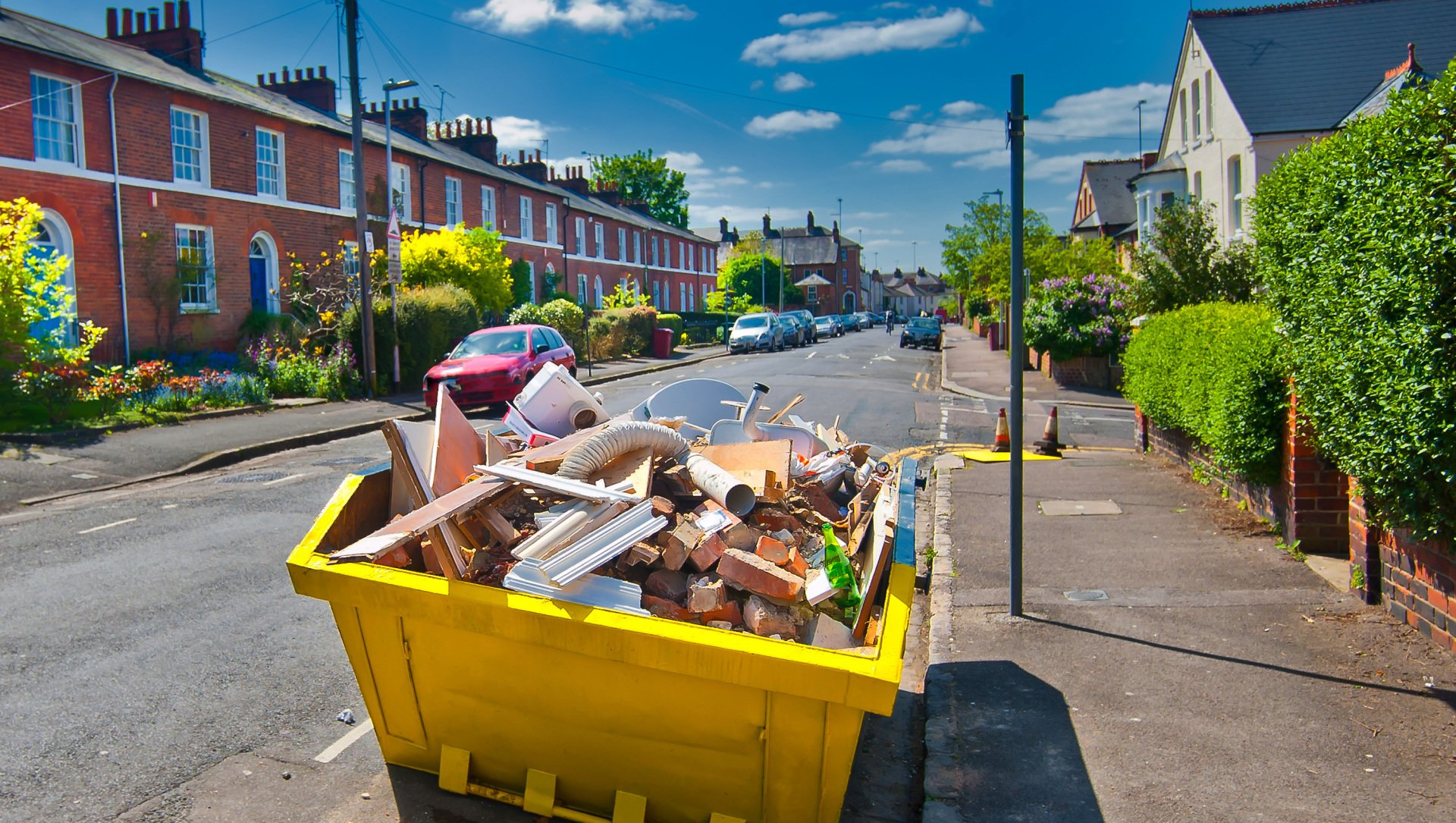 yellow skip on street