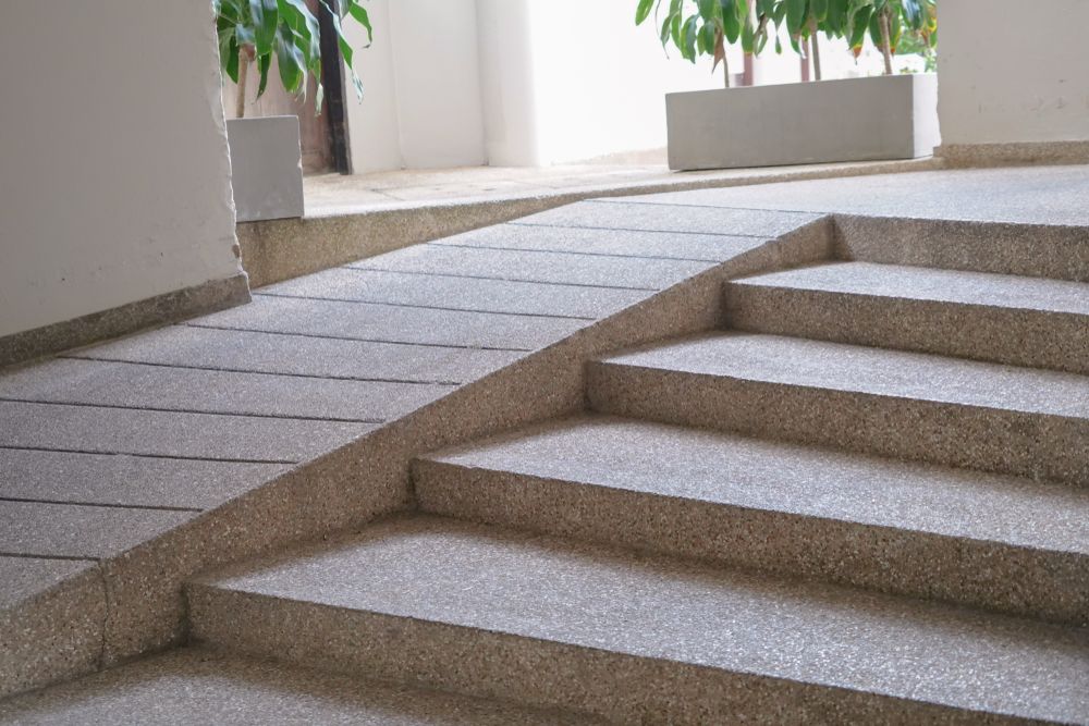 There is a ramp between the stairs and the ramp.