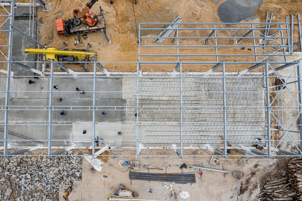 An aerial view of a building under construction.