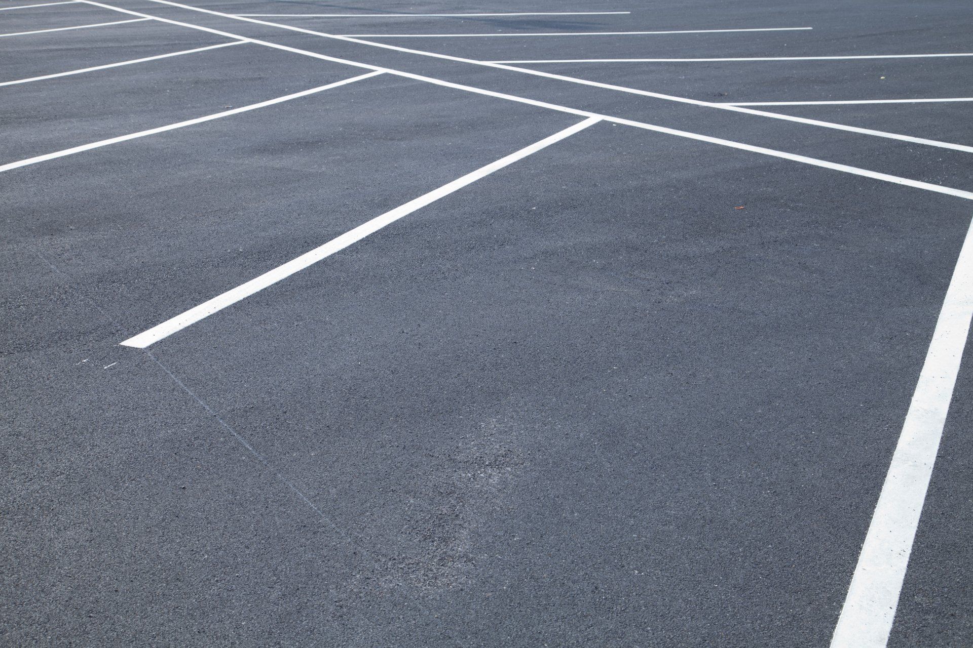 Sealing and striping the parking lot to assist people in clearly identifying these areas, ensuring that they're following the law and providing adequate accommodations for disabled residents or customers.