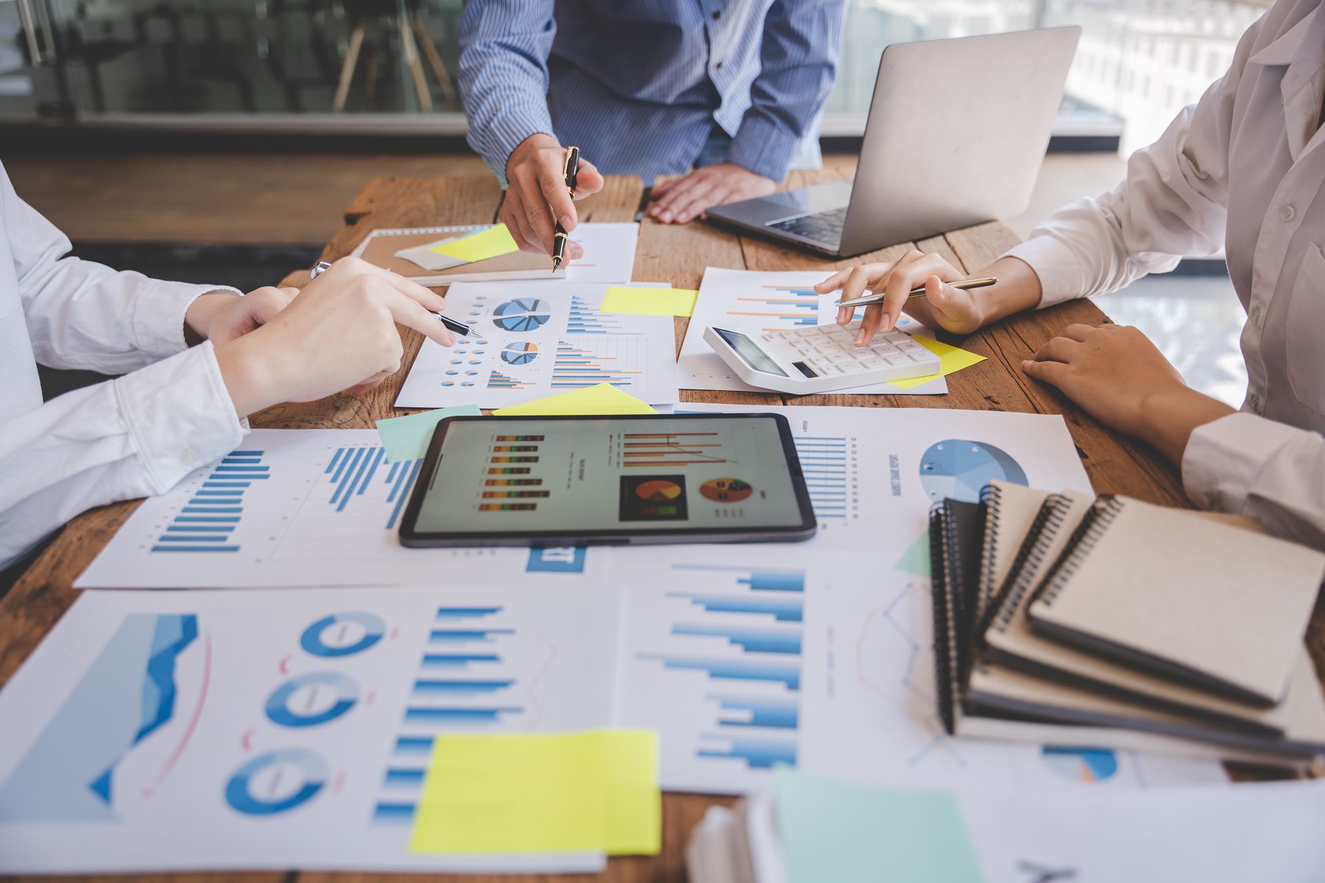 Business People on the Table — Alexandria, VA — Taxpayers Guardian LLC