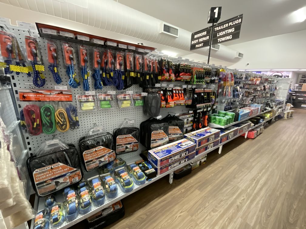 A Row Of Shelves In A Store Filled With Lots Of Tools — Camden Haven Auto Parts In Laurieton, NSW