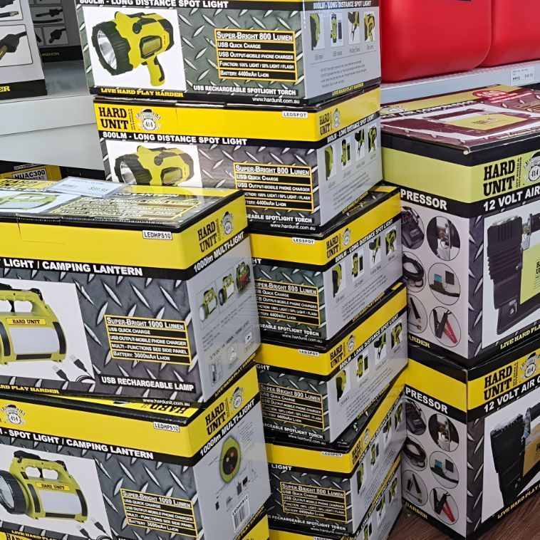 A Bunch Of Boxes Stacked On Top Of Each Other That Say Hard Unit — Camden Haven Auto Parts In Kew, NSW