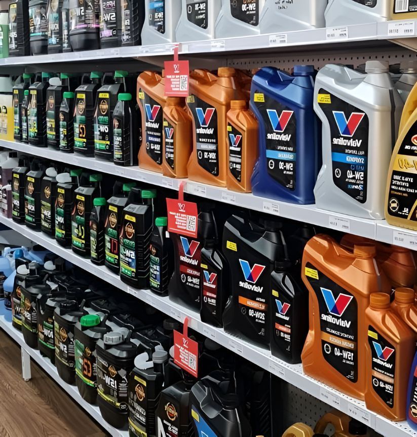 A Store Shelf Filled With Many Different Types Of Oil — Camden Haven Auto Parts In Laurieton, NSW