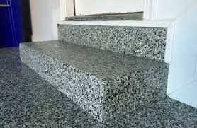 Gray speckle epoxy flooring for garage stairs in Traverse City, MI
