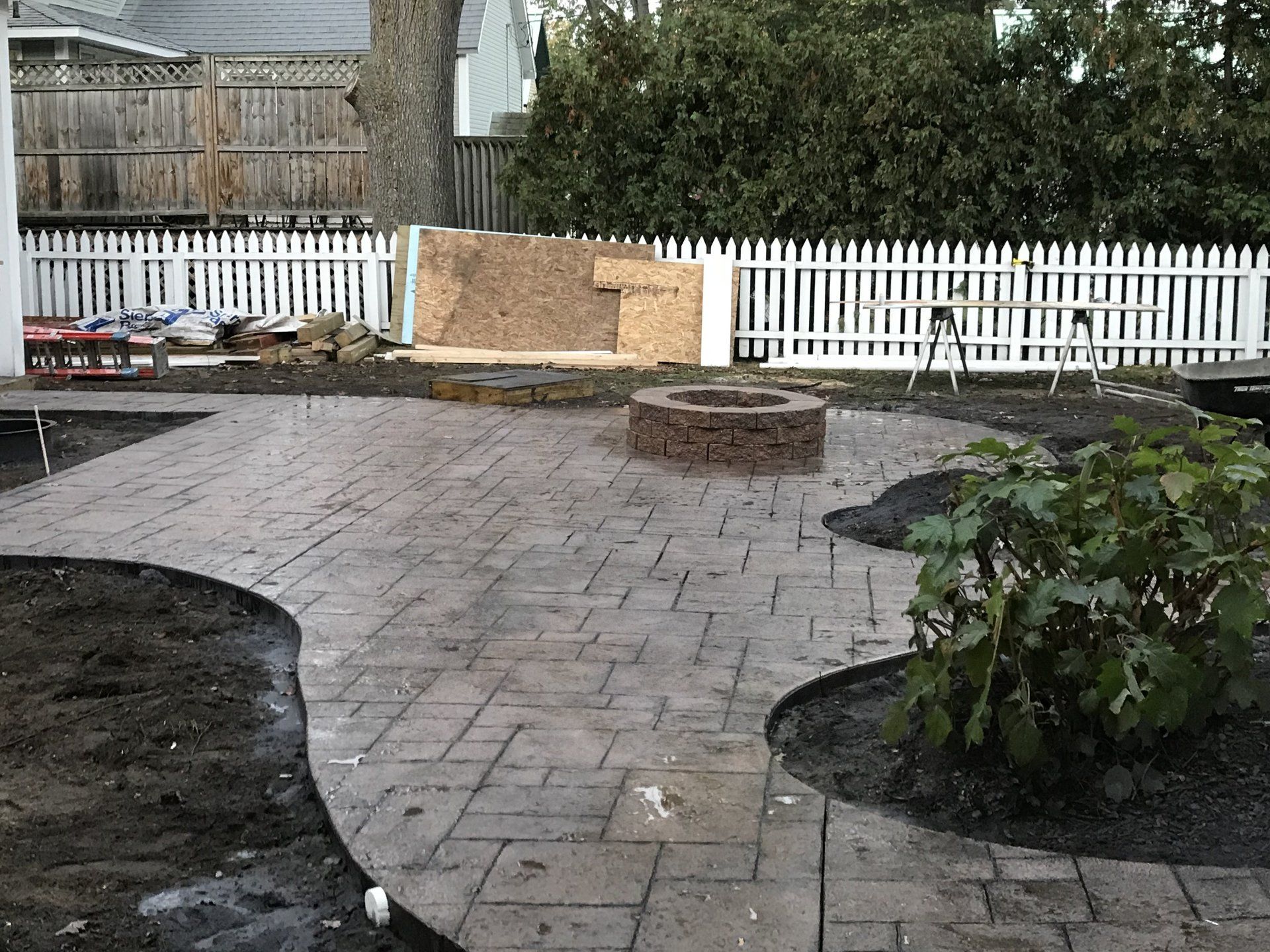 a decorative concrete & stone patio & stairs in the Traverse City, MI area