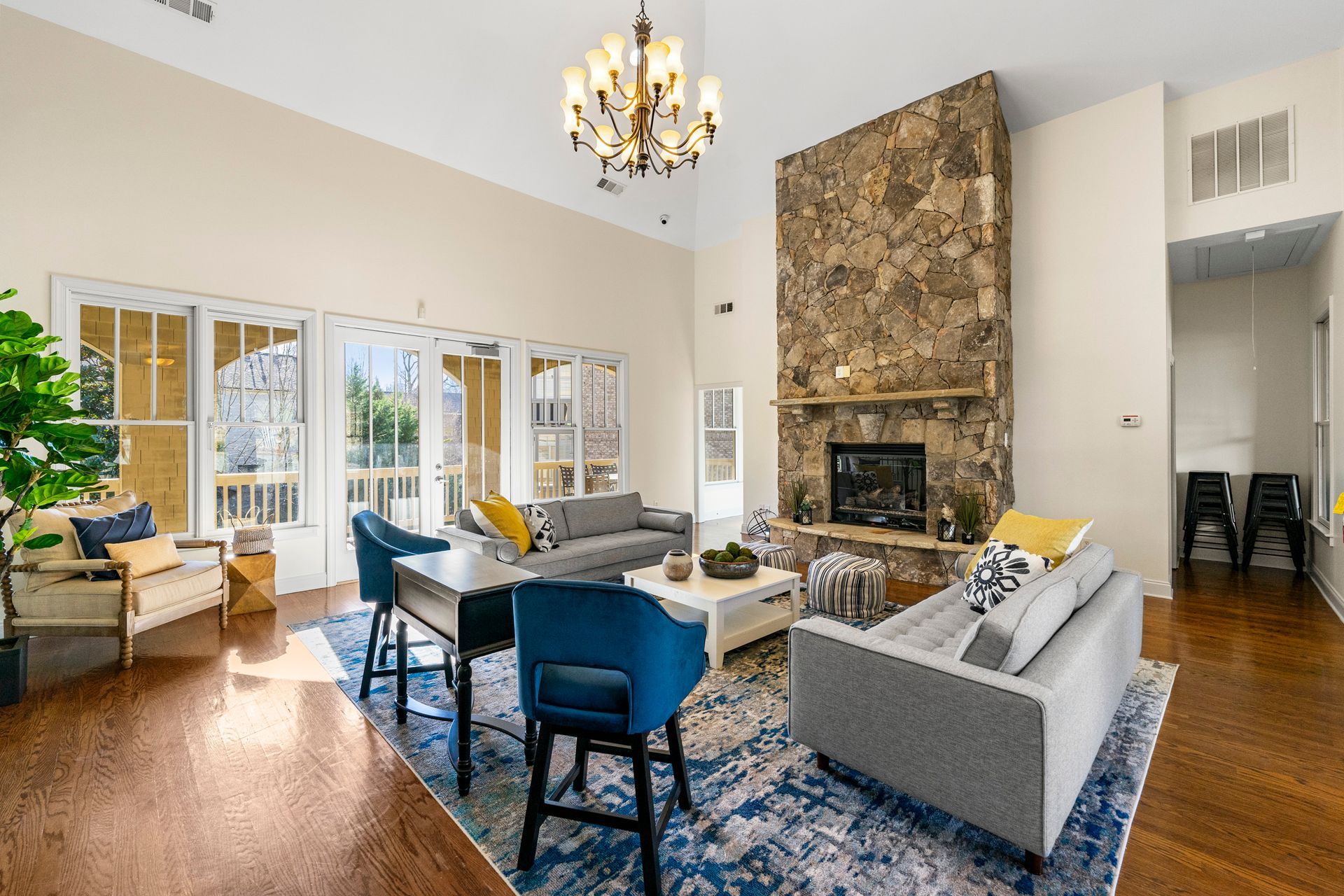 A living room filled with furniture and a fireplace.