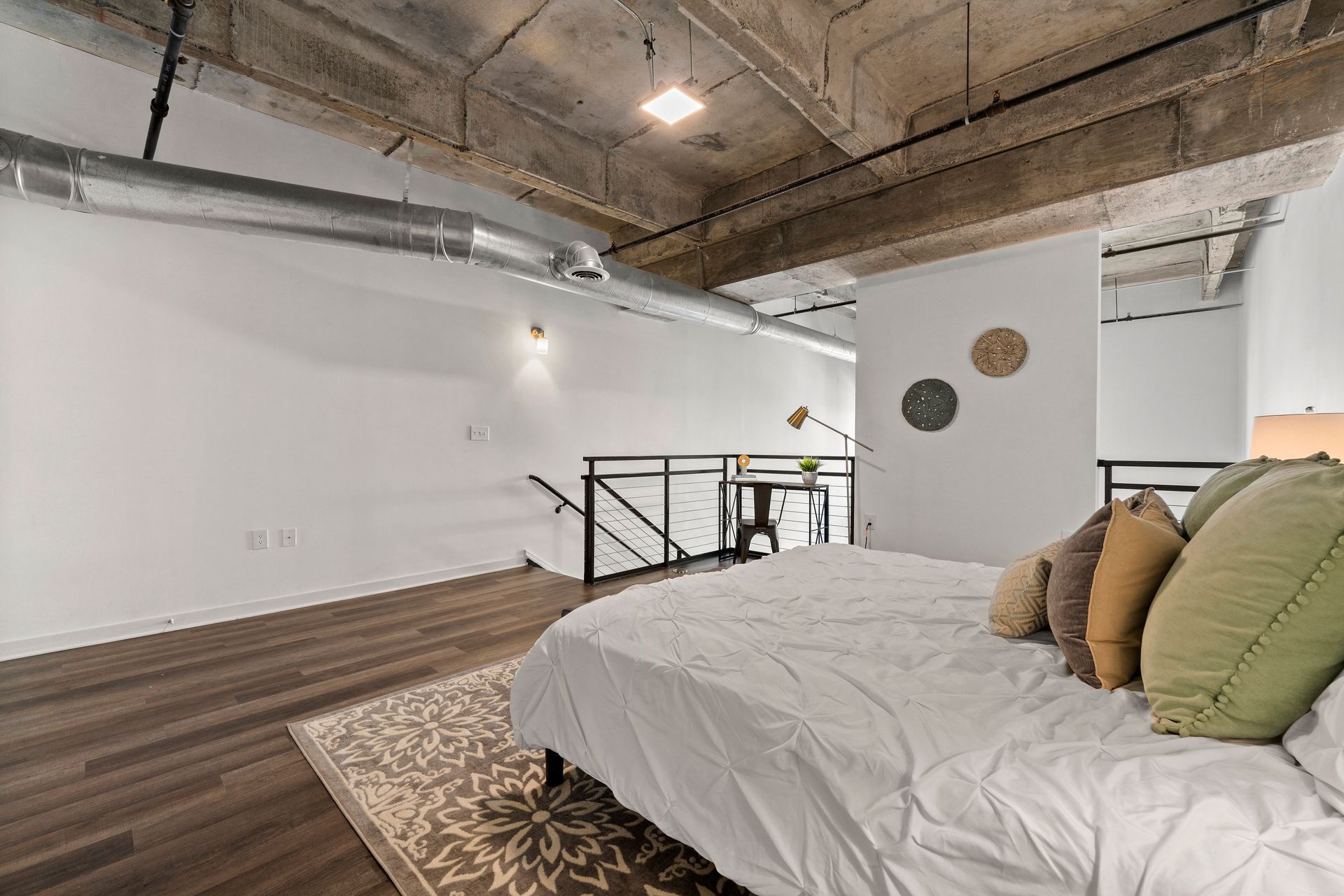 There is a large bed in the middle of the room.