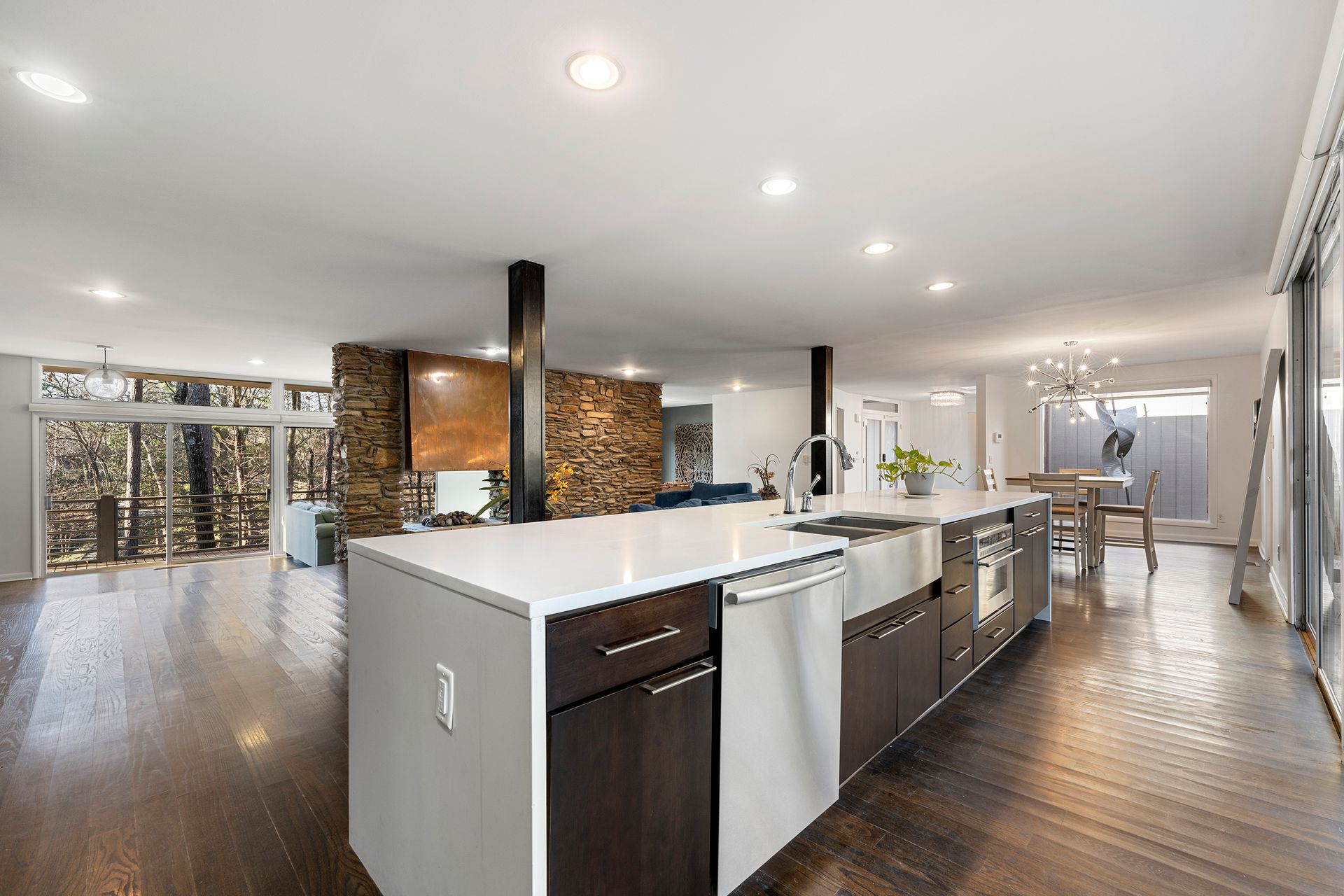 There is a large island in the middle of the kitchen.