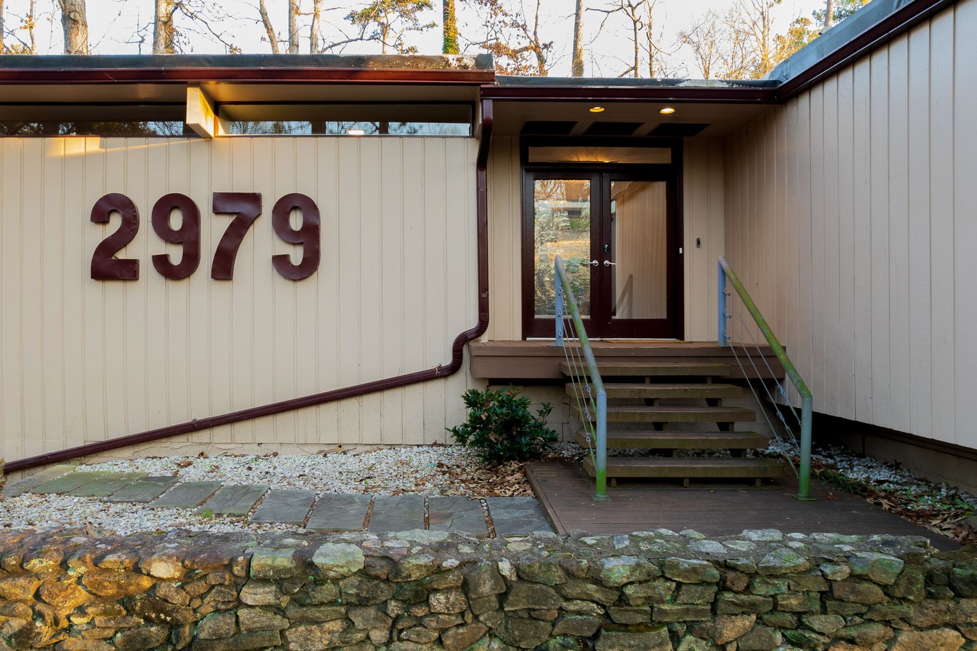 A house with the number 2979 on the side of it