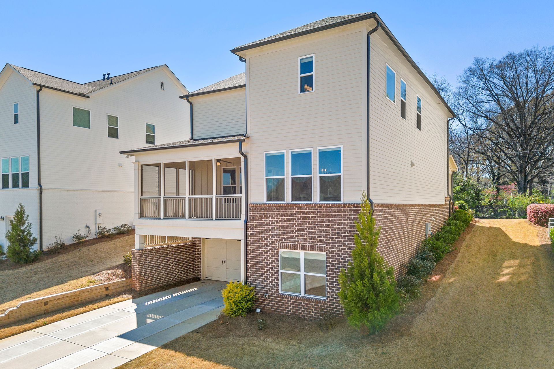 An aerial view of a house with a lot of windows