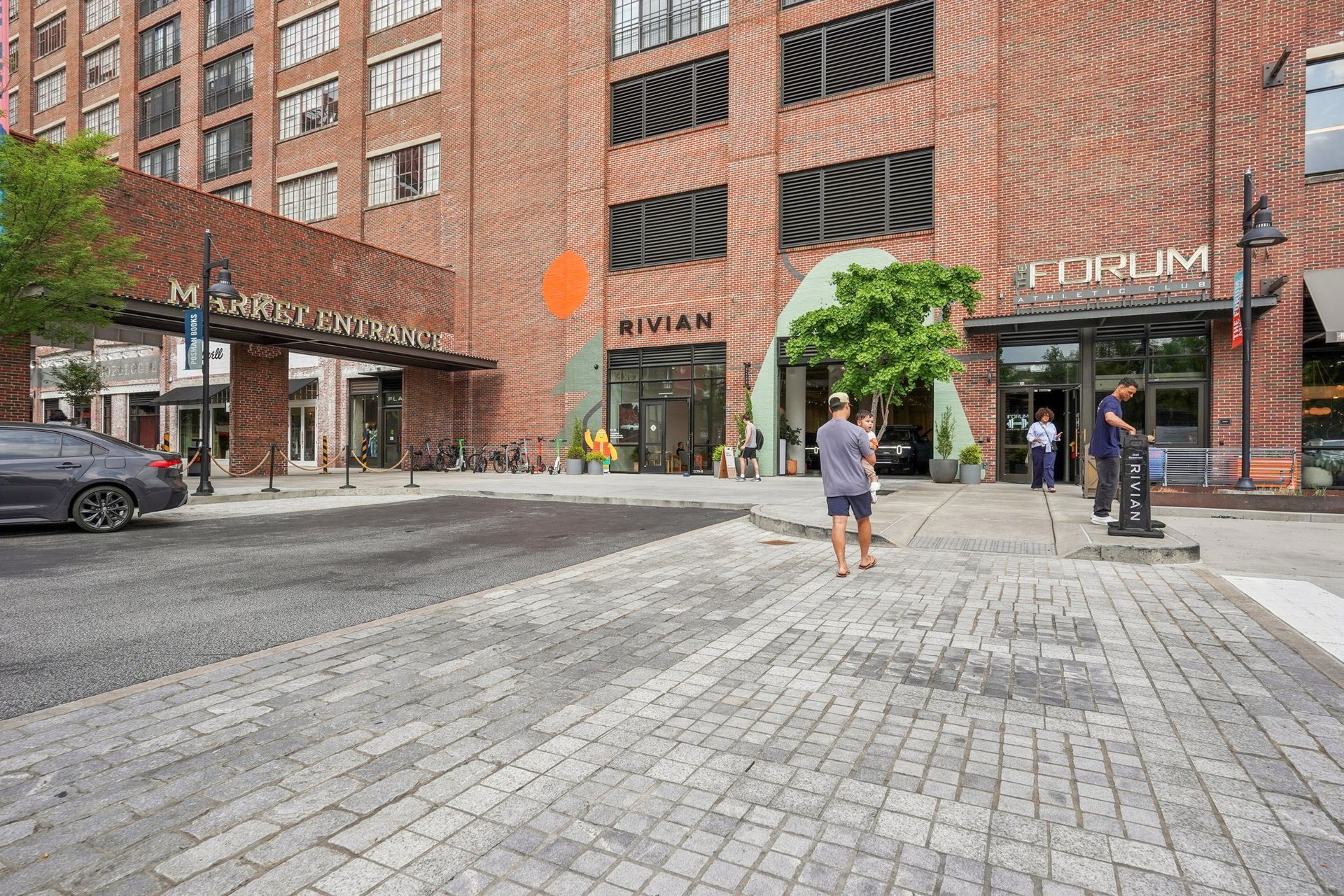 Brick building entrance labeled 
