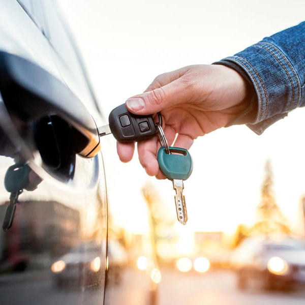 Lock Hardware — Man Opening a Car with a Key in South Bend, IN Lock Hardware — Man Opening a Car with a Key in South Bend, IN