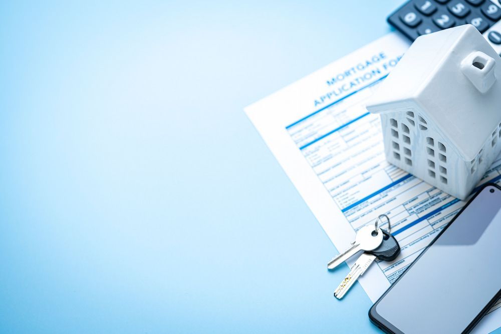 Mortgage Application, House Model, Keys, Calculator, and Phone — Into Finance Lending Solutions in Harrington, NSW