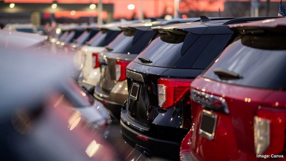 SUVs Parked in a Lot; Various Colors, Including Red, Black, and Tan — Into Finance Lending Solutions in Coomba Bay, NSW