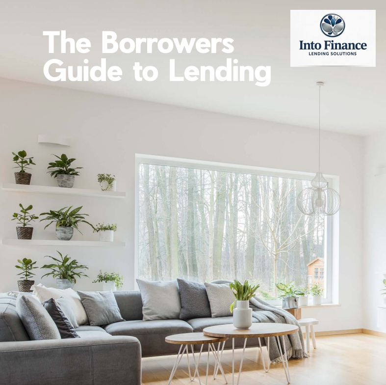 Two People at a Desk Review Documents and Calculations — Into Finance Lending Solutions in Coomba Bay, NSW