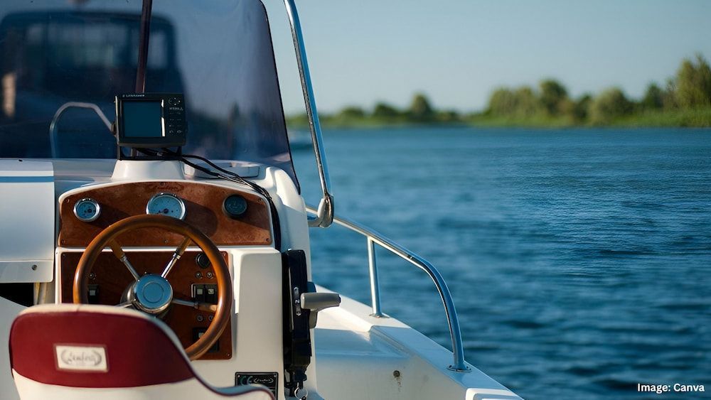 Boat Helm With Wooden Wheel on Water, With Trees in the Distance — Into Finance Lending Solutions in Coomba Bay, NSW