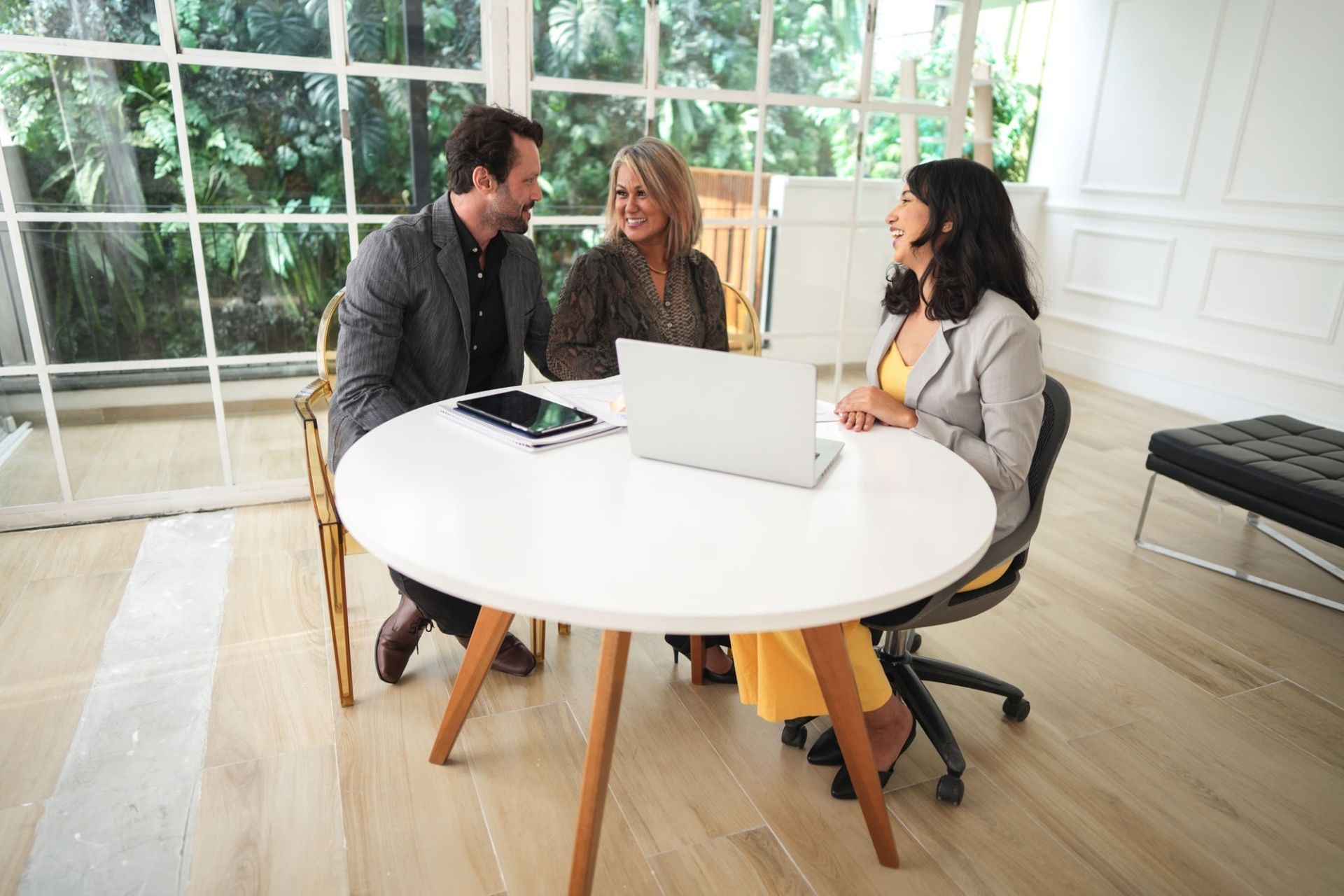 Three People at a Round Table — Into Finance Lending Solutions in Coomba Bay, NSW