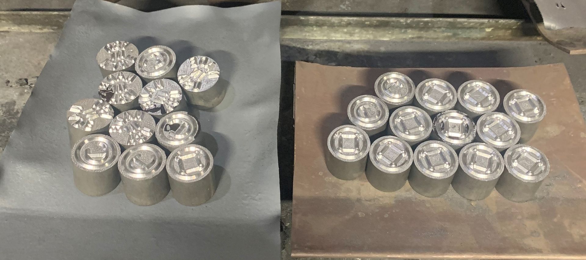 Two piles of machined metal parts.