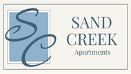 The logo for sand creek apartments is blue and white.