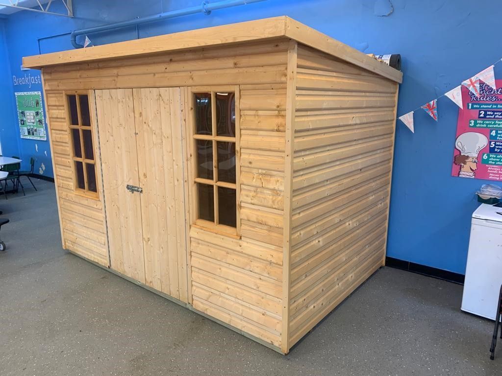 10' x 6' Chalet Style Shed with no felt on roof as it has gone inside a hall to create a corner for mental health.