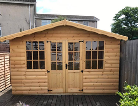 Picture of a summerhouse, mortice lock and key taking you to a range of other styles. 12' x 10' Summerhouse pictured. All built to order.