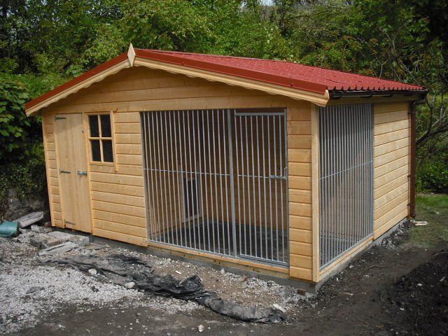 14' x 10' Kennel and run with the kennel designs in an L shape from down the left side and along the back. Galvanised metal work for the run. 4 pane window to allow for light as you walk into the kennel side which has storage then the kennels are on the back.