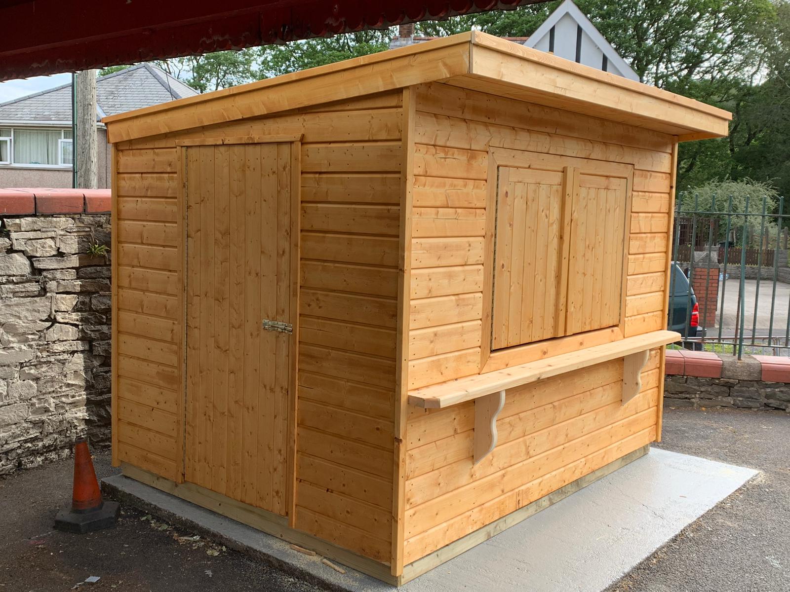 9' x 7' pent style snack shop. The style used in a school. Great for serving food and drinks to parents and children on sports days or other events.