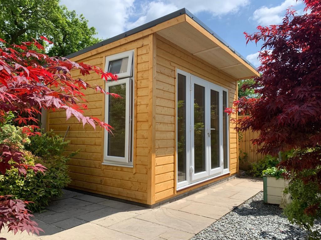 12' x 9' Pent Contemporary Summerhouse with Metal Box Profile Roof Sheets. PVC French doors in white and a side window with tilt and turn.