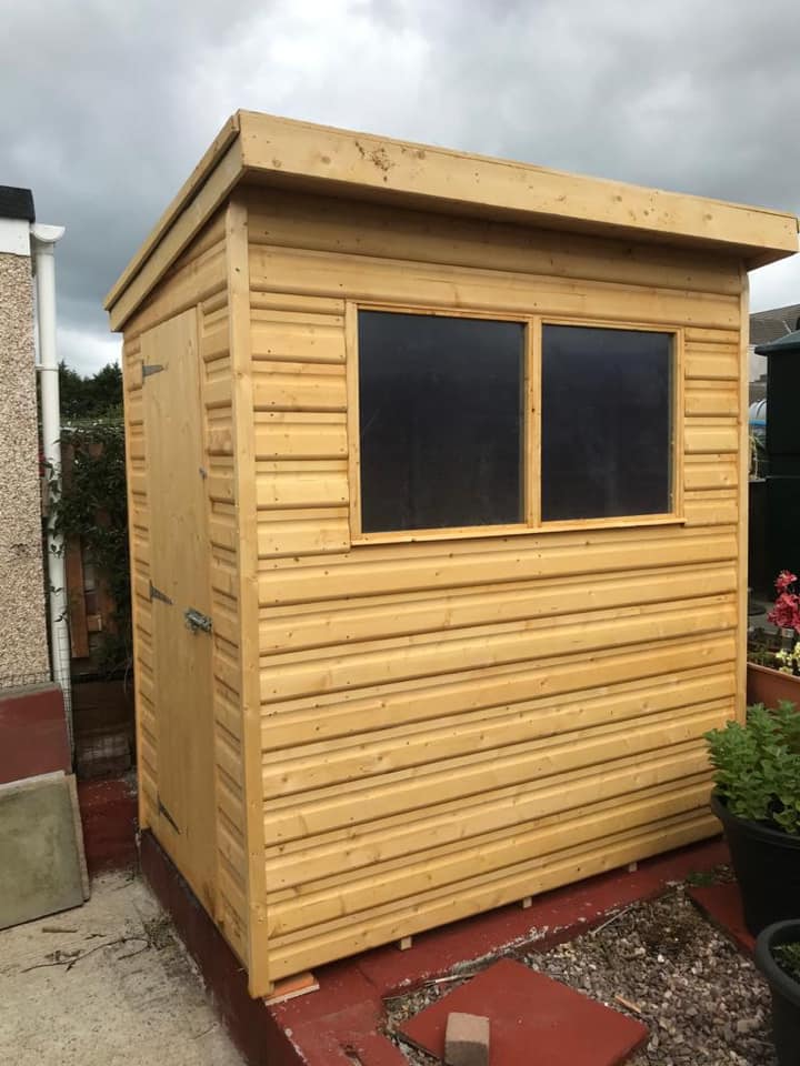 4' x 6' Pent shed with the double windows on the long side and the door on the short side.