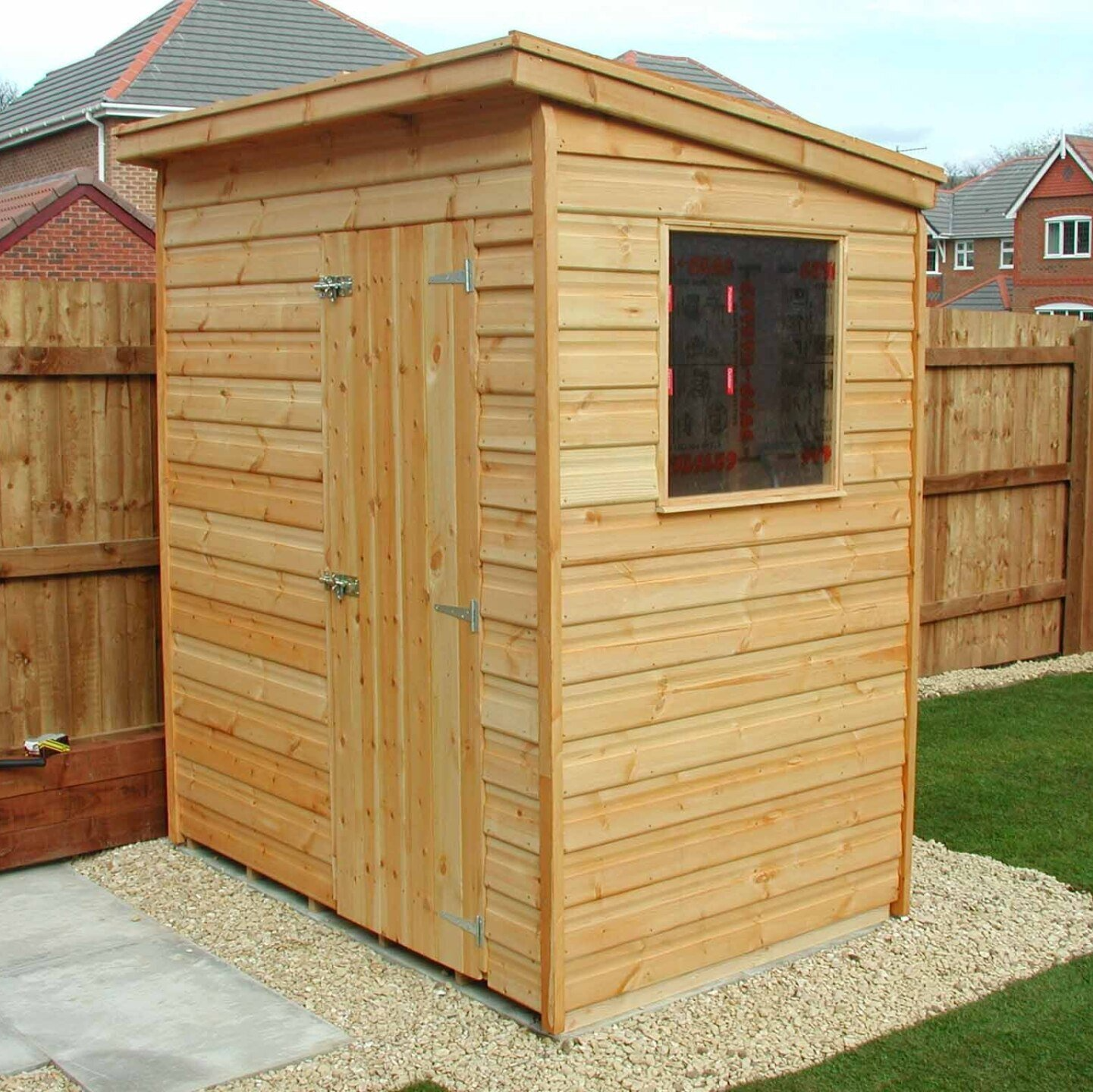 6' x 4' Pent shed with door on 6' side then a window on the 4' side.
