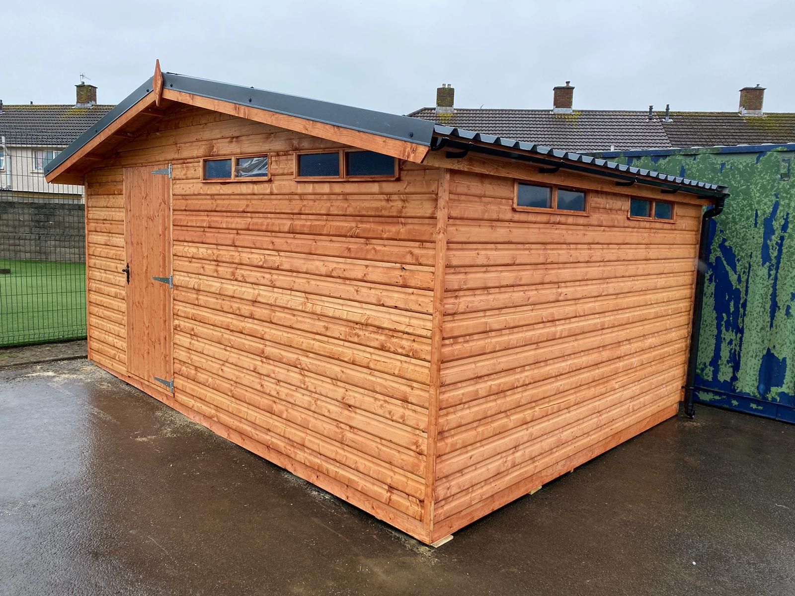 Storage shed with security windows. Metal Box profile roof sheets.