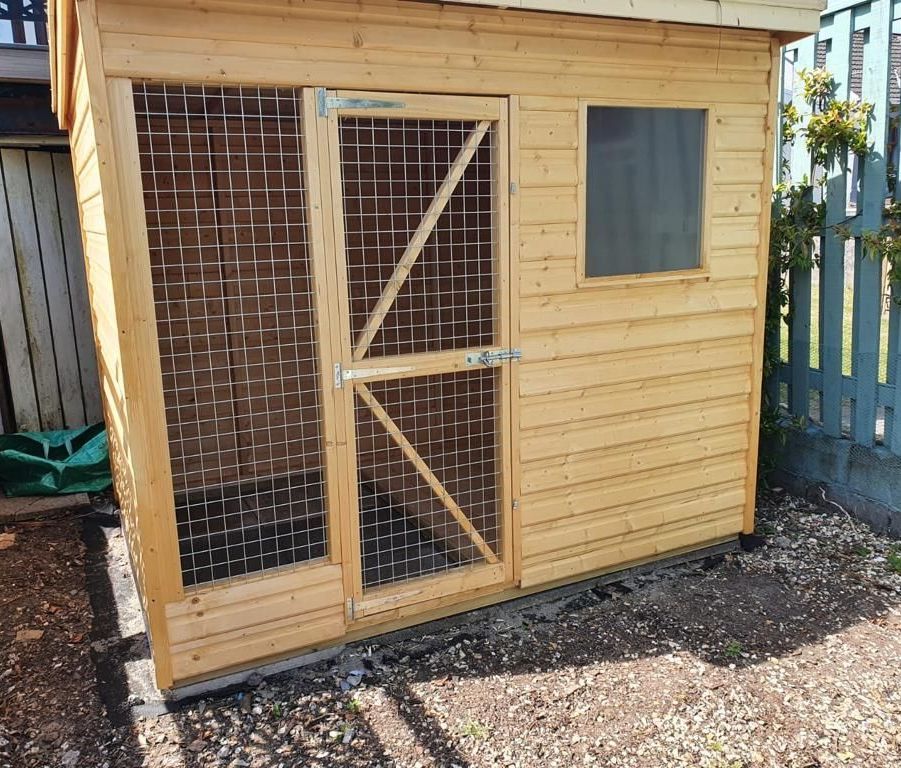 Full shed height kennel. Mesh window along the left from top to bottom allowing the dog to see out. Mesh door with locking tower bolt. Clear Perspex window in the run area. No division in this one as its for a large dog