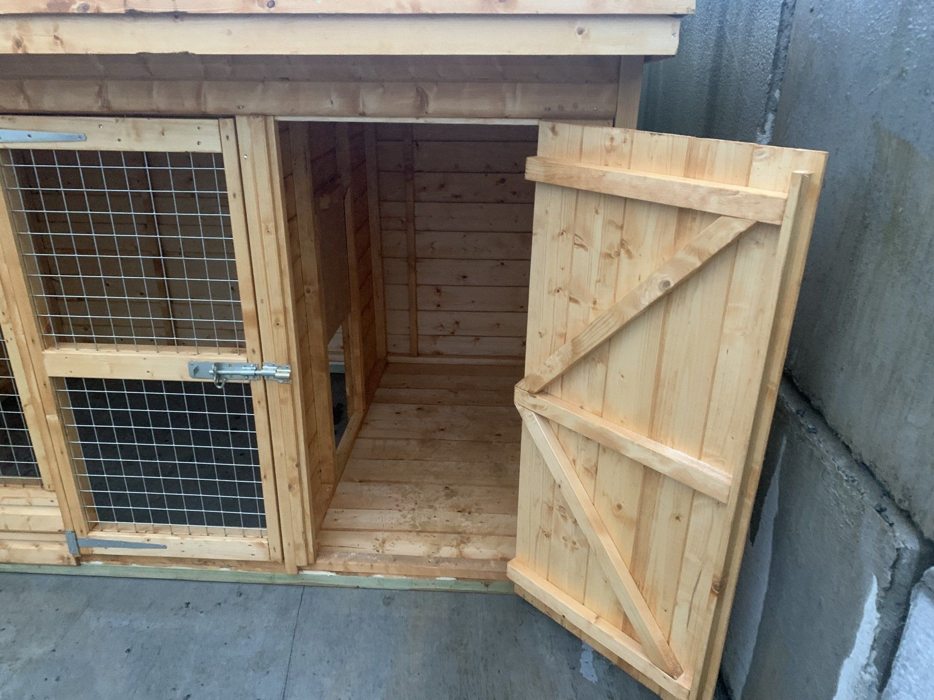 8' x 5' Kennel and run with the shutter between the run and kennel.