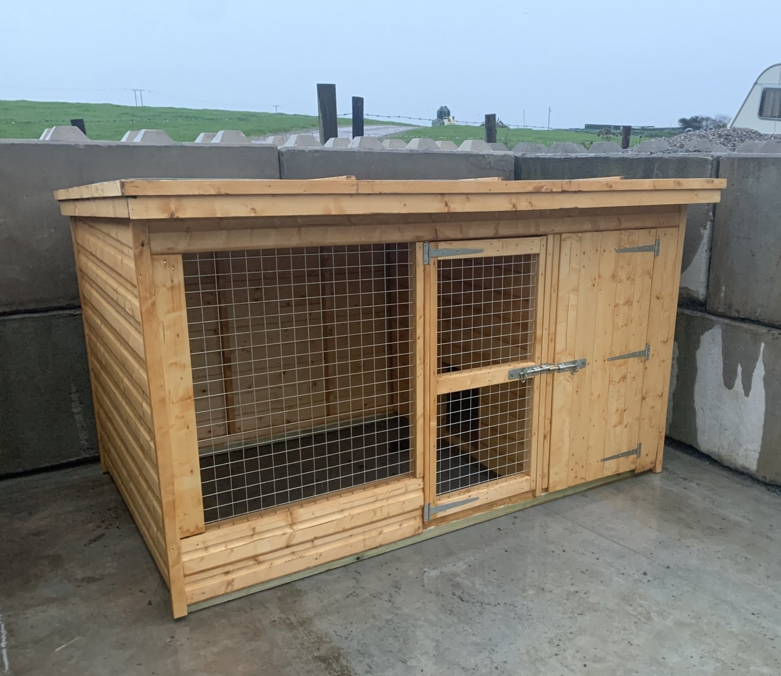 8' x 5' Kennel and run. No floor on the run and a wooden 19mm floor on the kennel side.