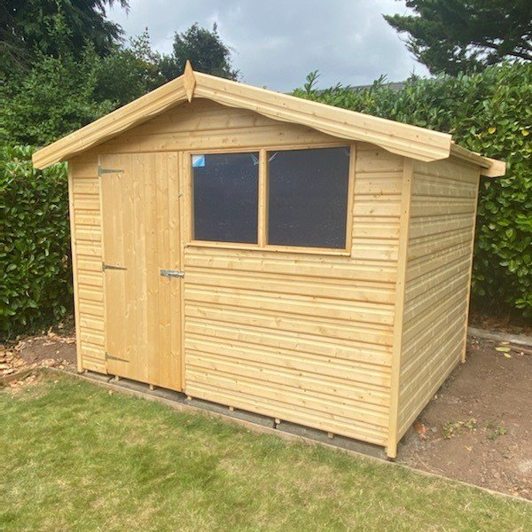 9'x7' Apex Shed with door to the left and 4'x2' windows on the right.