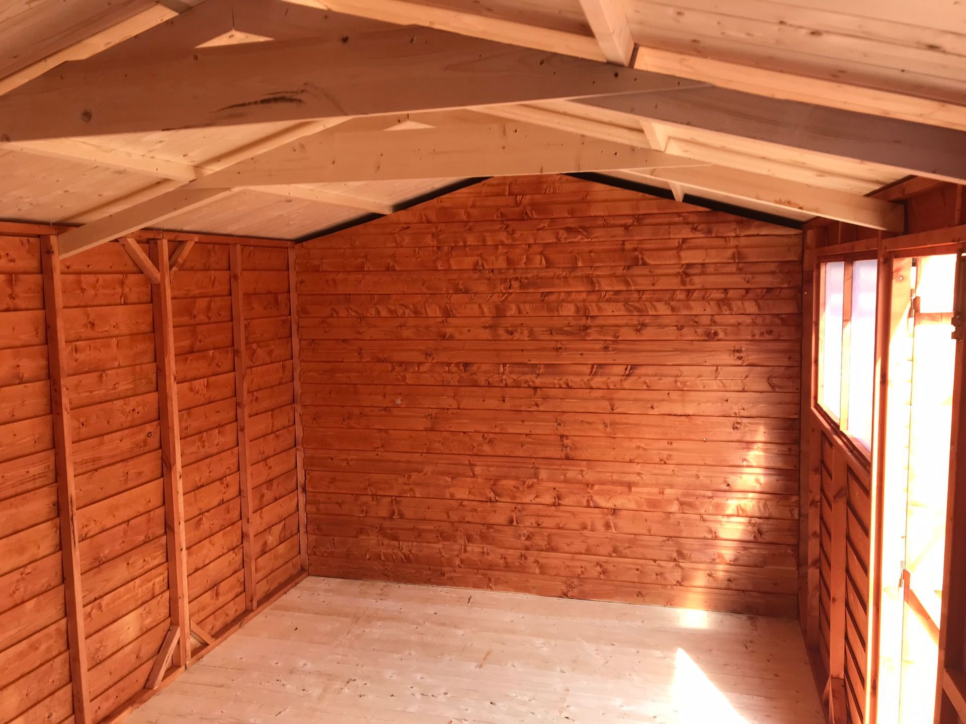 Photo of the inside of a shed showing an internal divider