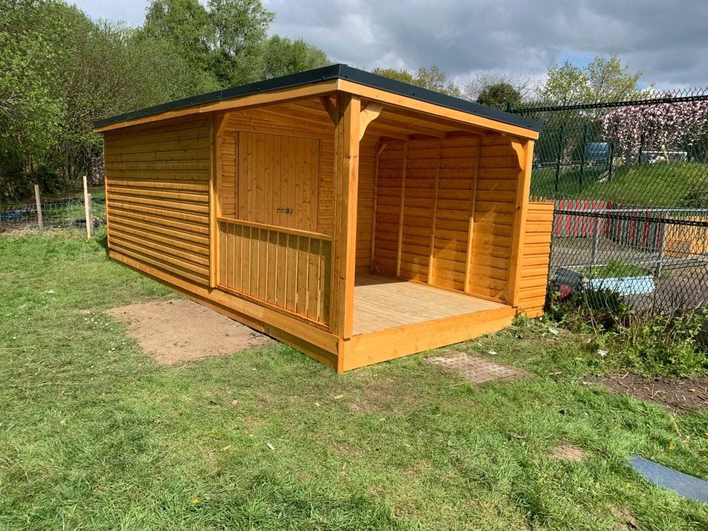 Delivered in Rhos Primary School with 14' x 8 Shed with a 8' x8' decked area. Overall size is 14' x 16'