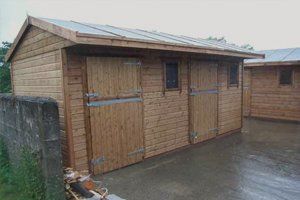 Block of stables for Carmarthen College.  Chew strips on the doors.