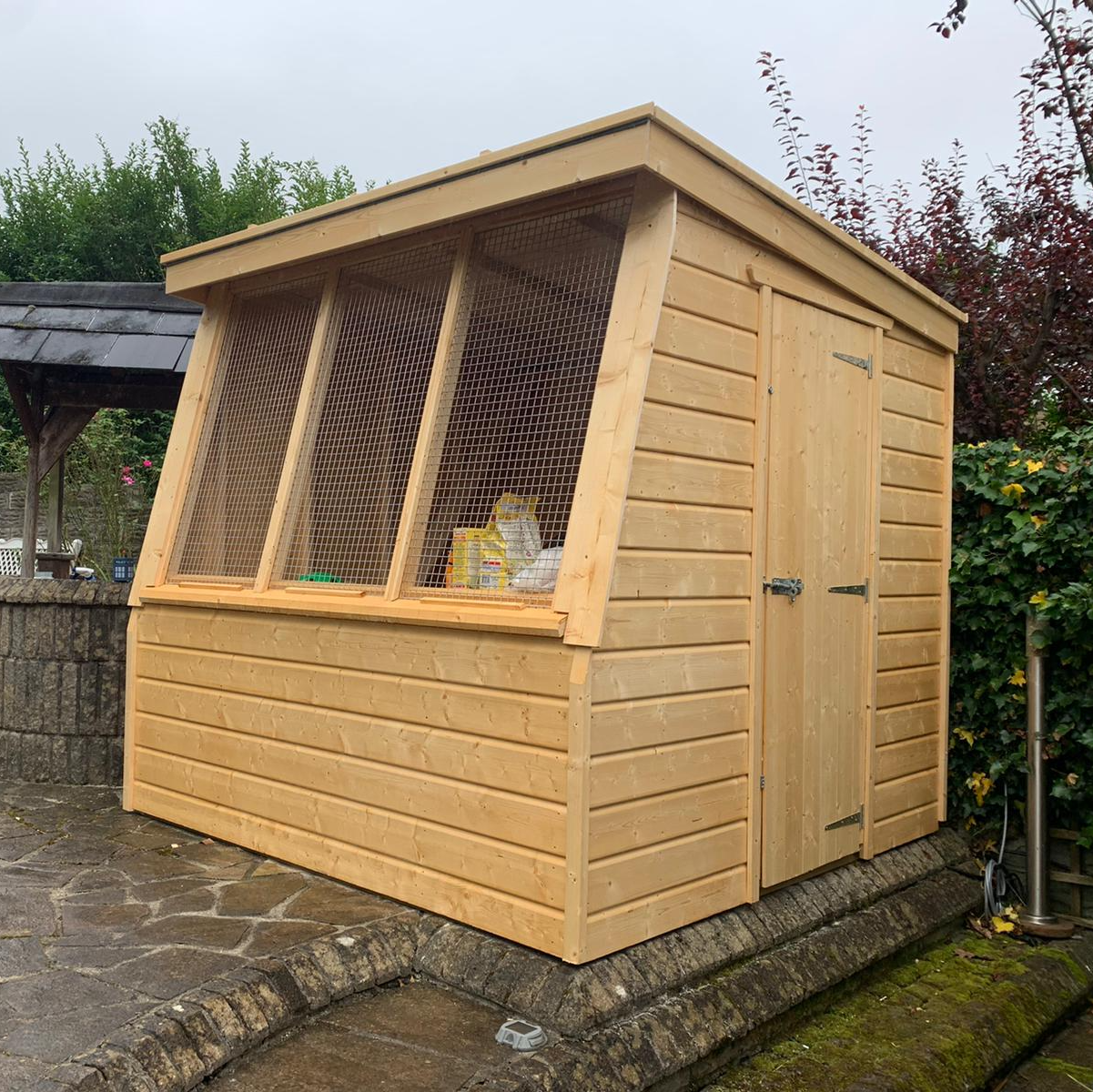 potting shed used as a cattery for a cat rescue place in Bryncoch. Mesh instead of the perspex but option to put perspex over the top during the bad weather so it can still be used.